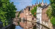 Bruges’ canals wind gracefully, full of charm and offering a unique perspective.